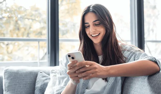 woman looking at phone